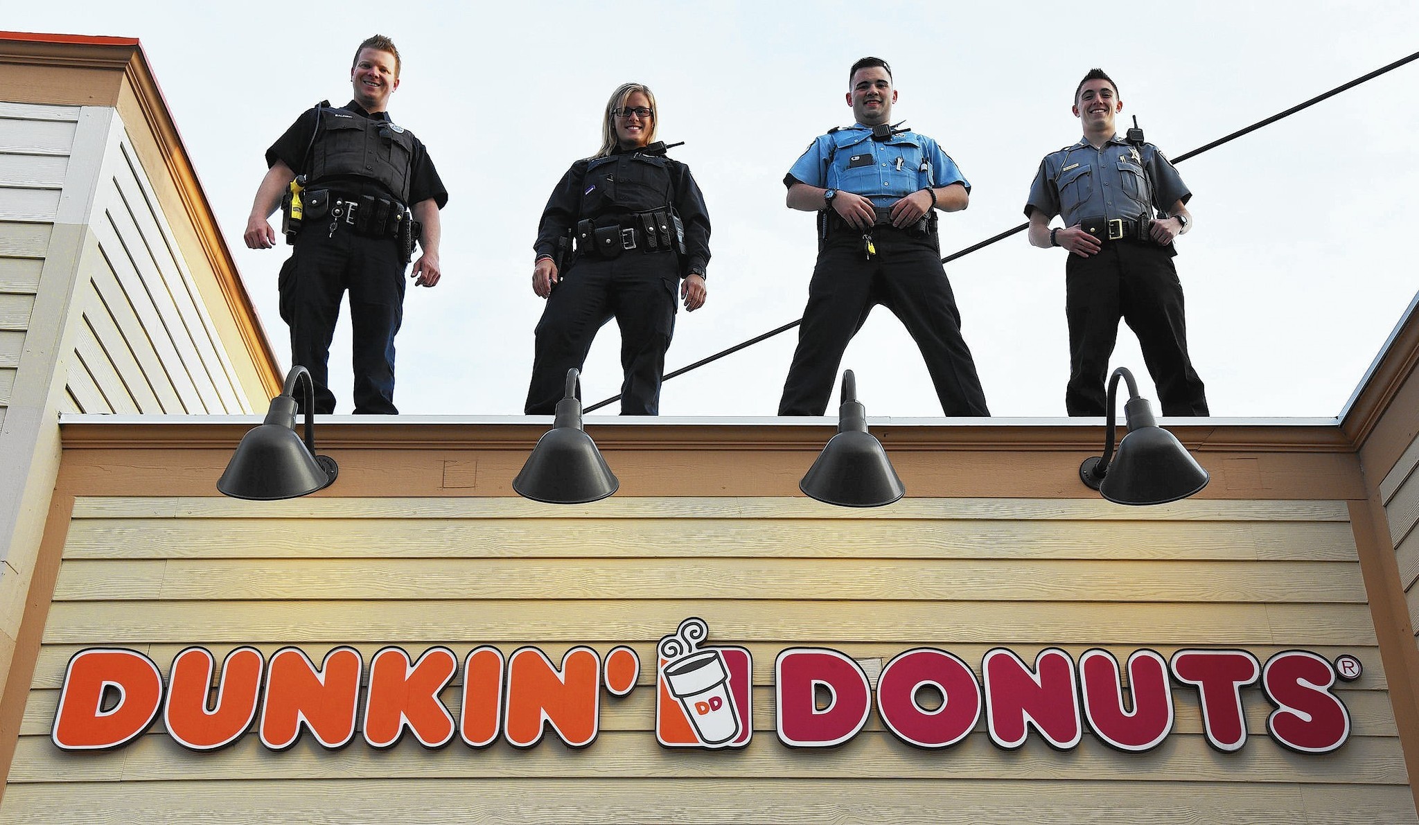 Dunkin' Cop on a Rooftop